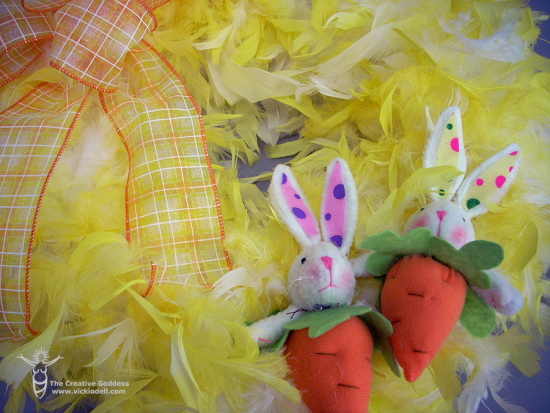 attach Easter bunny to feather wreath