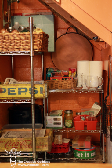 Small under-stairs root cellar